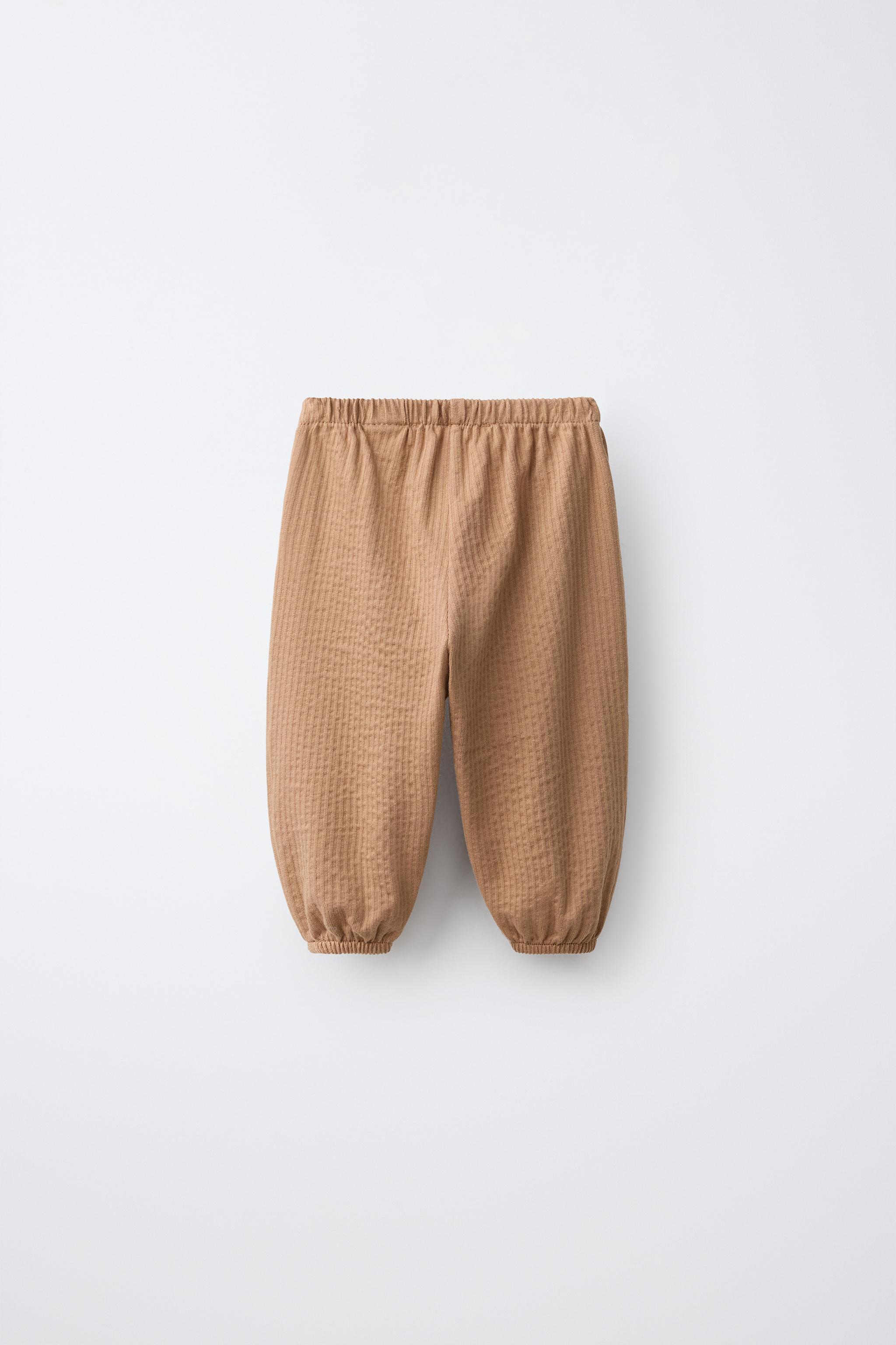 PANTALON TEXTURÉ UNI
